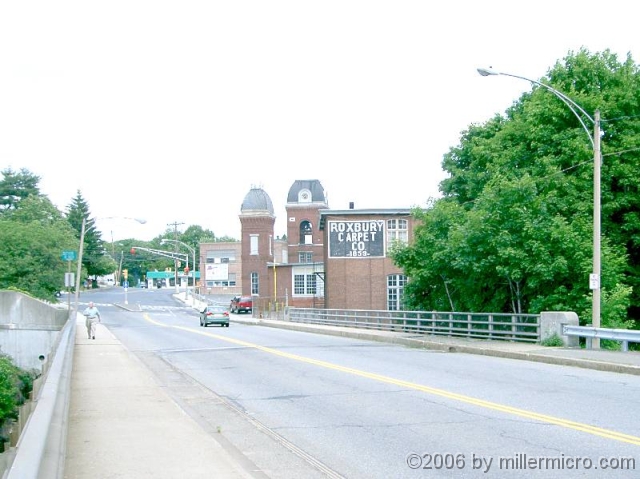 040613RoxburyCarpet PART 10 - Saxonville.
The old Saxonville Mills that led the railroad  here in 1846, later became Roxbury Carpet Company. Now home to many smaller businesses, the old mills provide a historic focus to the northeast Framingham community of <a href=http://www.framingham.com/sax-walk/index.htm>Saxonville</a>.