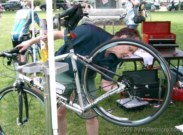 PeterHenryAtTourDeNatick040620 Peter Henry, an owner of Landry's Bicycles, provides free bike tune-ups before the Tour de Natick. Landry's is just one of many businesses that enthusiastically support good local rail trails.