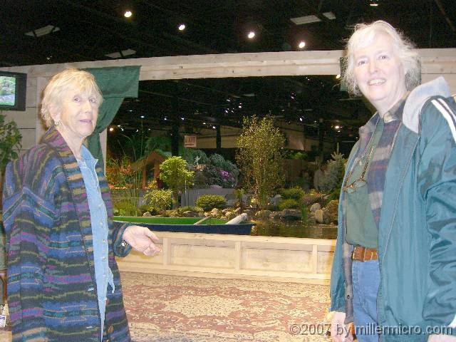 070323FlowerShow616 Carole Berkowitz and Jill Miller admire a 