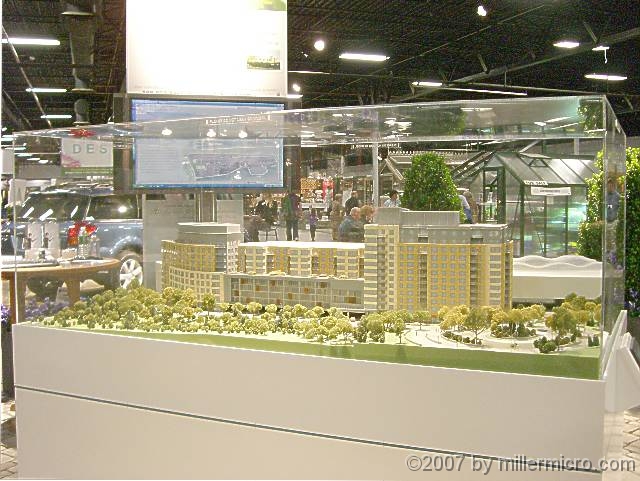 070323FlowerShow745 The rapidly-expanding Natick Mall has renamed its two residential towers from 
